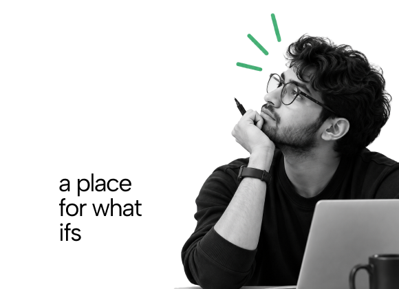 A curious team member deep in thought at a laptop
